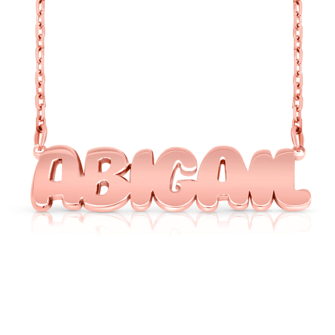 A sample of the nameplate with the name Abigail in Rose Gold