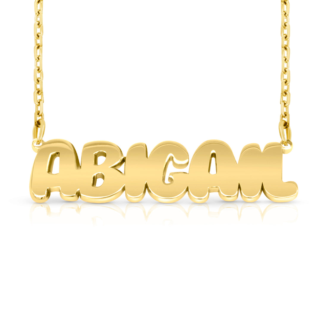 A sample of the nameplate with the name Abigail in Yellow Gold