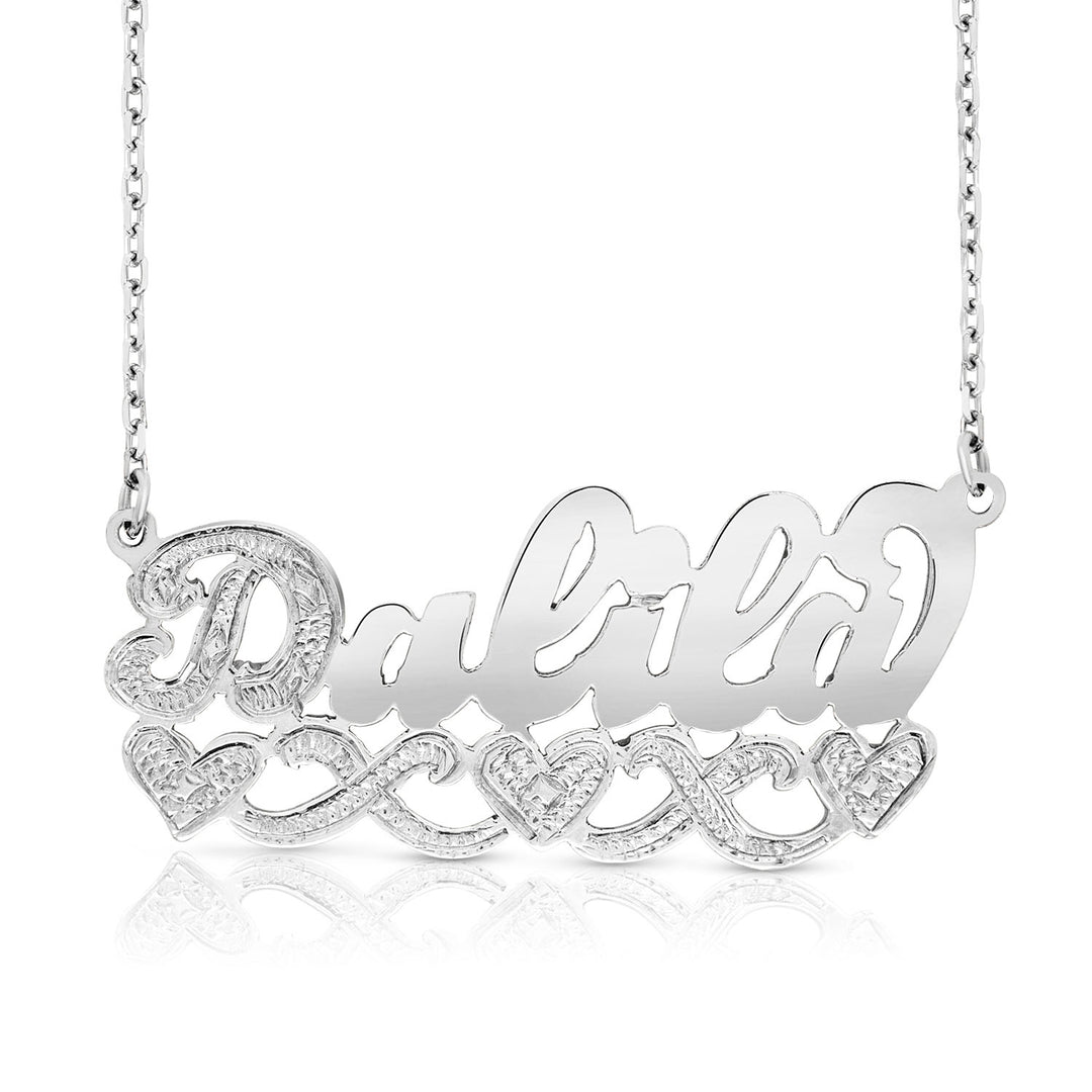 A Sample of the Sterling Silver Name Necklace with Three Hearts with the name Dalila in White