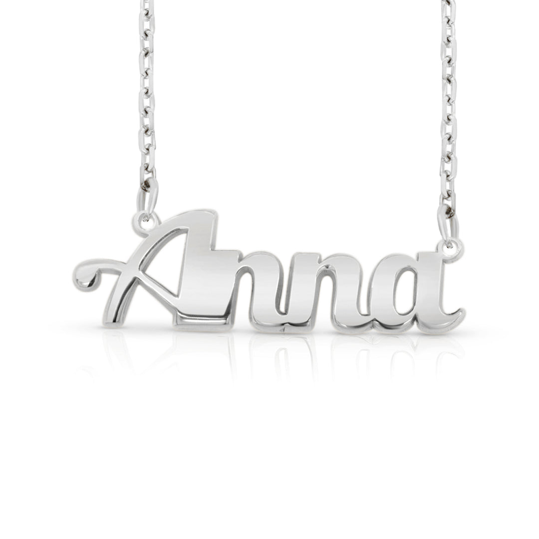 A sample of the nameplate with the name Anna in White Gold