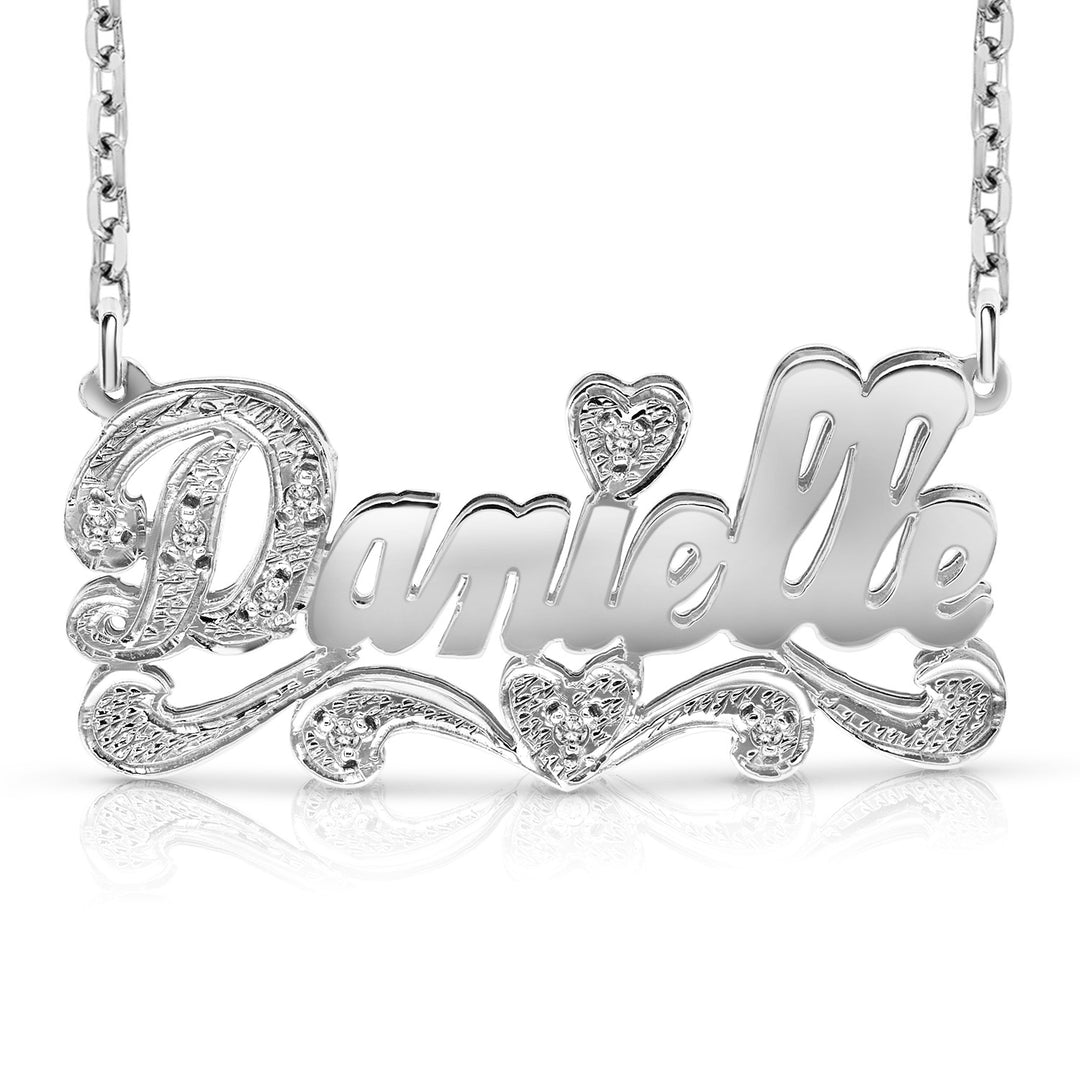 A Sample of the Sterling Silver Polished and Diamond Cut 3D Name Necklace with the name Danielle in White