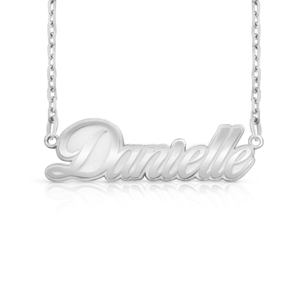 A sample of the nameplate with the name Danielle in White Gold