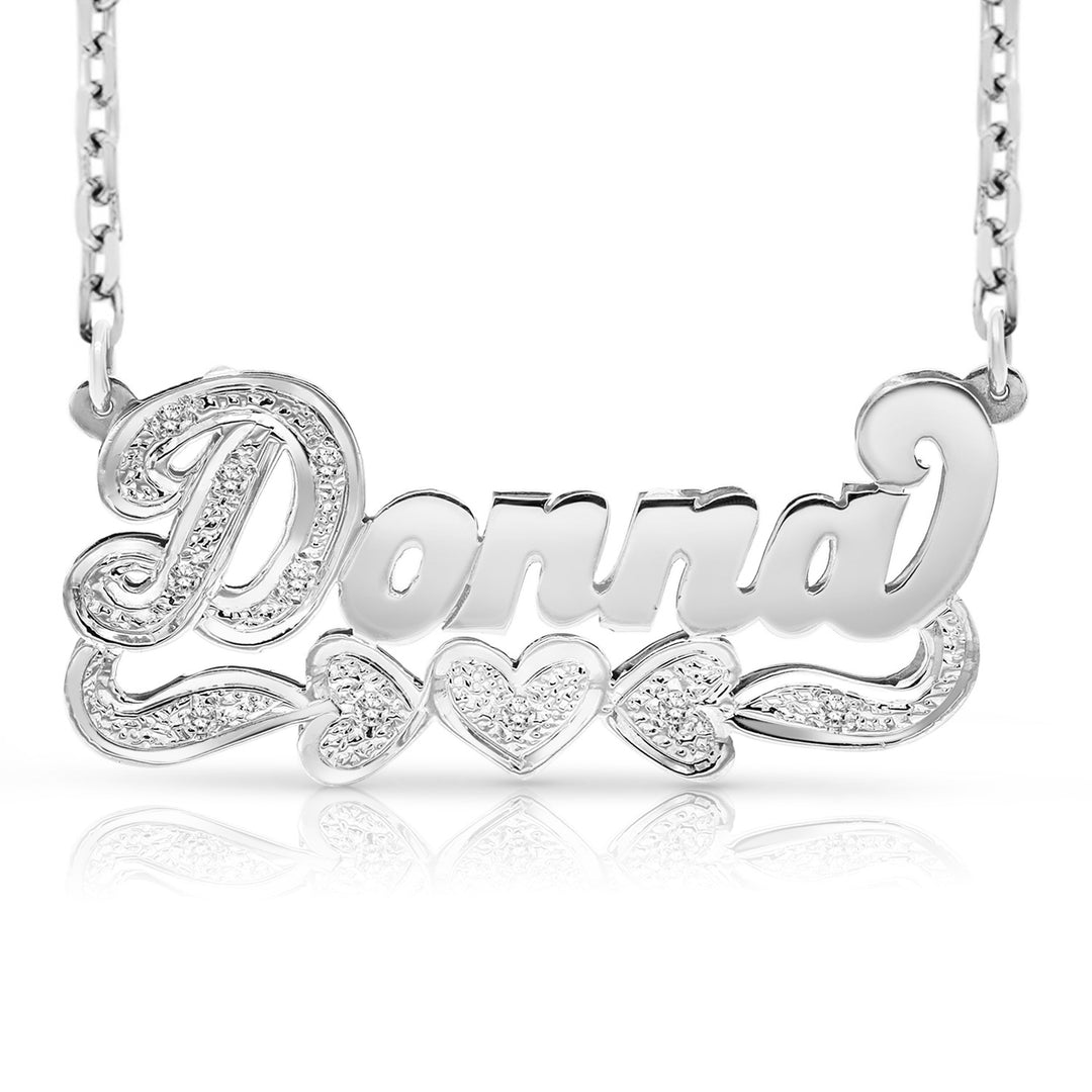 A Sample of the 14 Karat 3D Name Necklace with Three Hearts with the name Donna in White