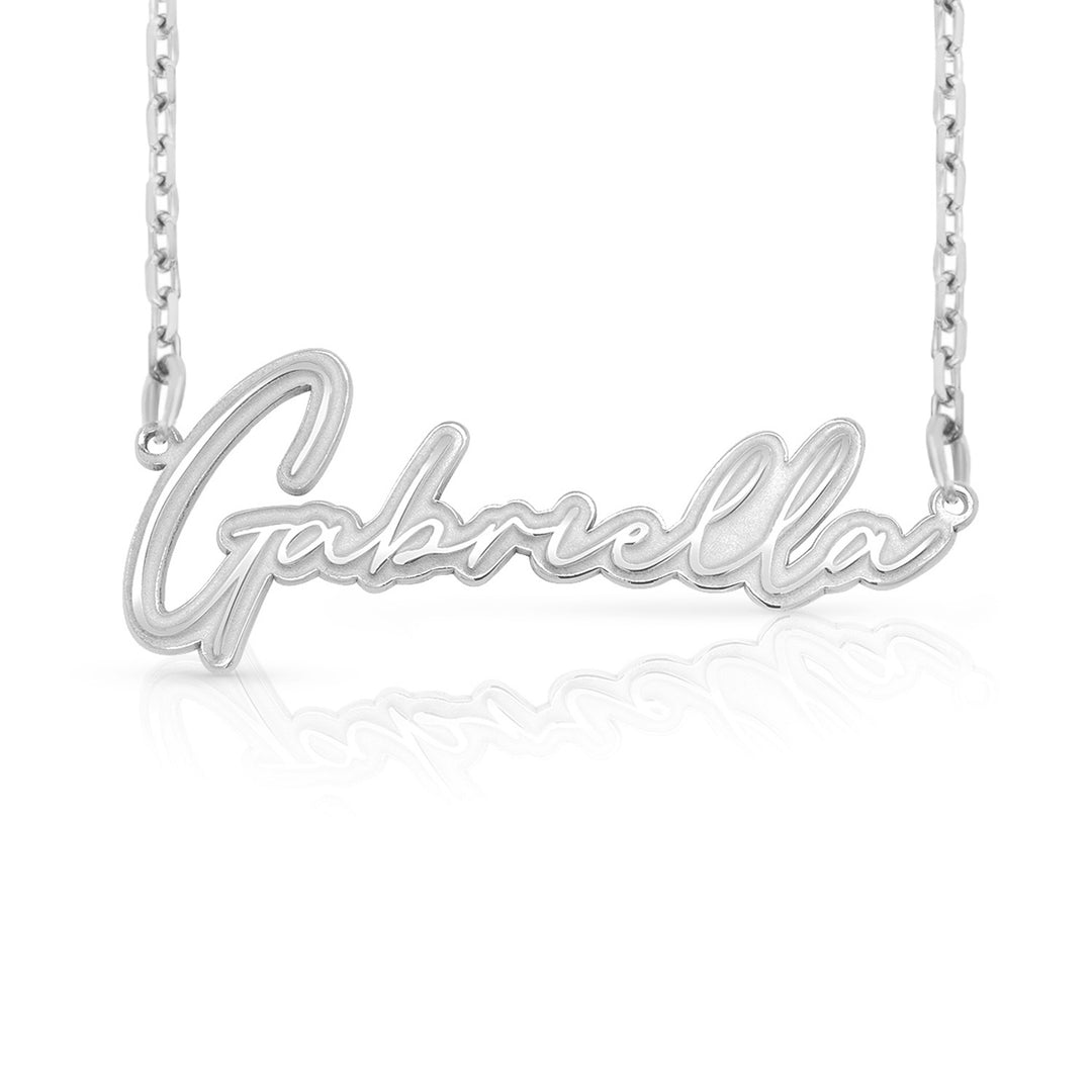 A sample of the nameplate with the name Gabriella in White Gold