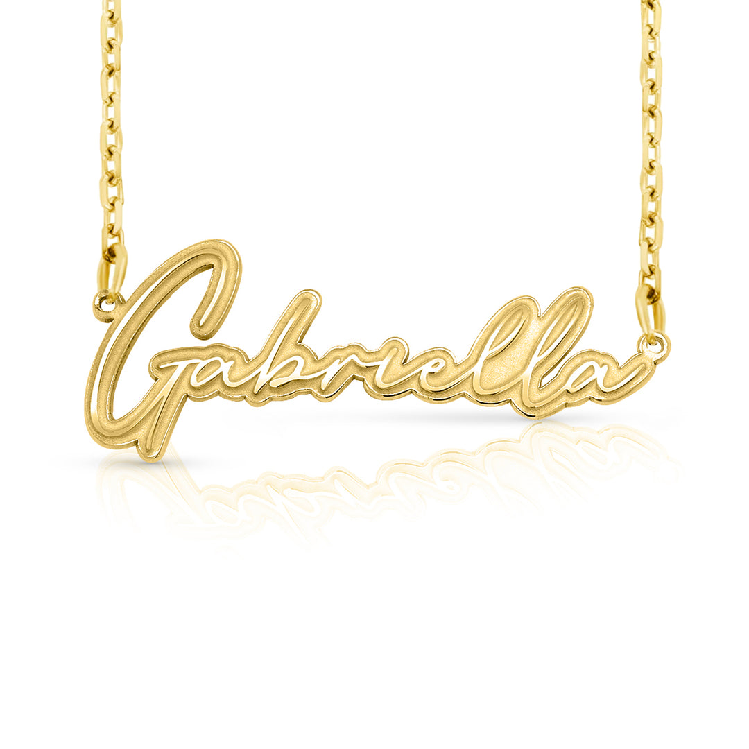 A sample of the nameplate with the name Gabriella in Yellow Gold