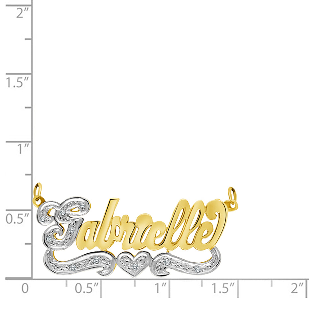 A Sample of the 14 Karat Script 3D Name Necklace with One Heart with the name Gabrielle on a size chart for reference