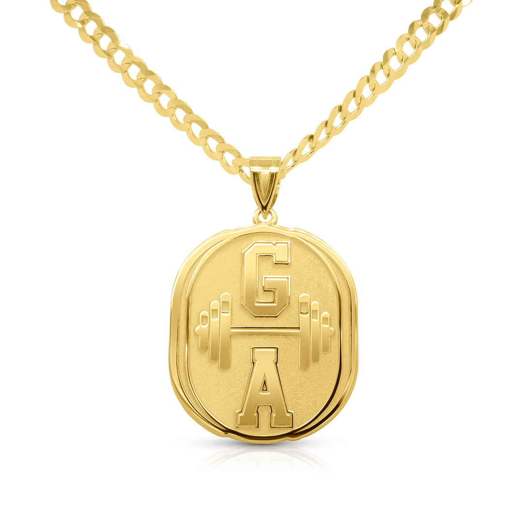 Yellow gold chain with custom pendant on a white background