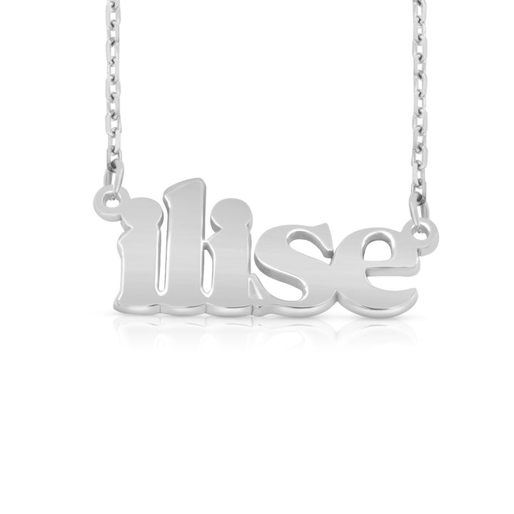 A sample of the nameplate with the name Ilise in White Gold