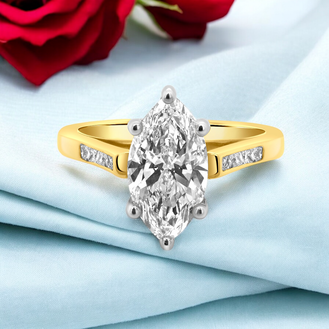 A image showing a front view of the final presentation of the 14 Karat Two-Tone Lab Grown Marquise Engagement Ring