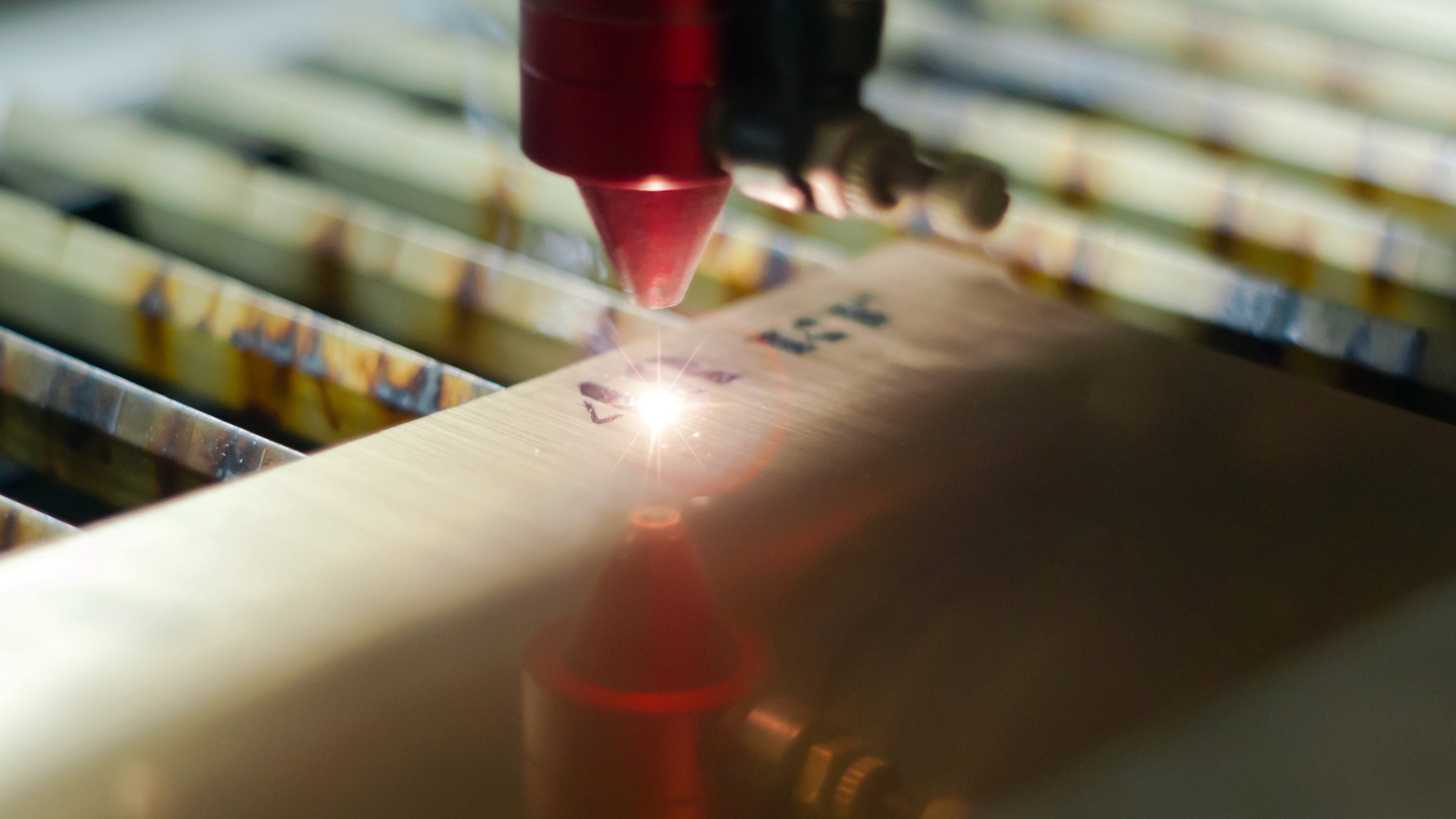 An image showing a laser engraving being done