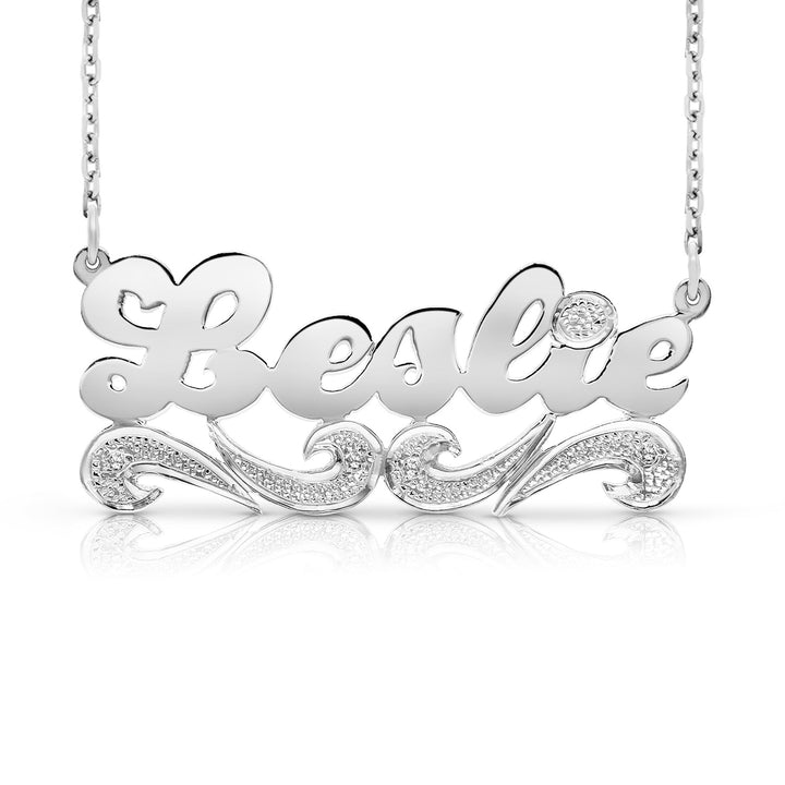 A Sample of the Sterling Silver Script Name Necklace with Tail with the name Leslie in White