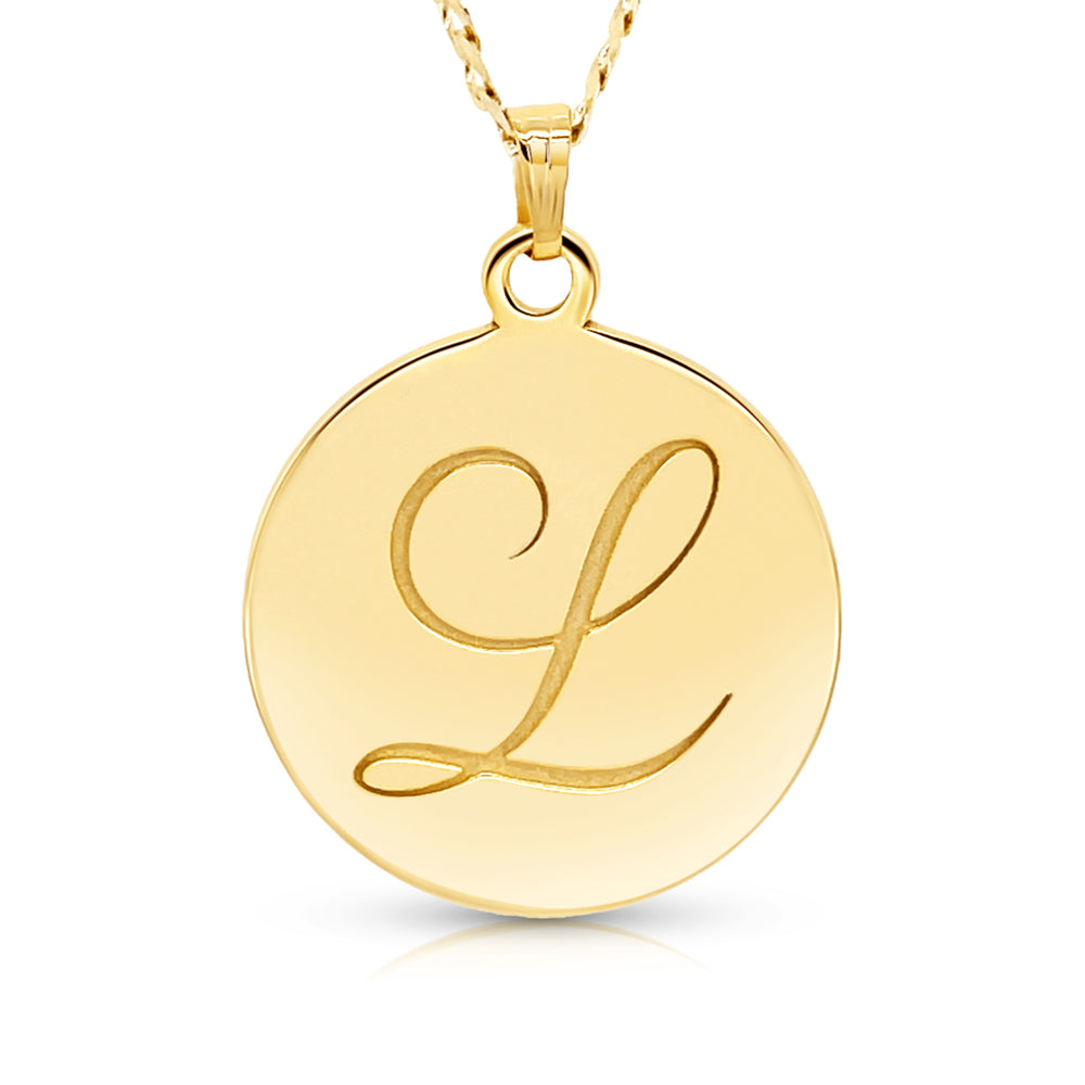 Yellow gold chain with round pendant on a white background