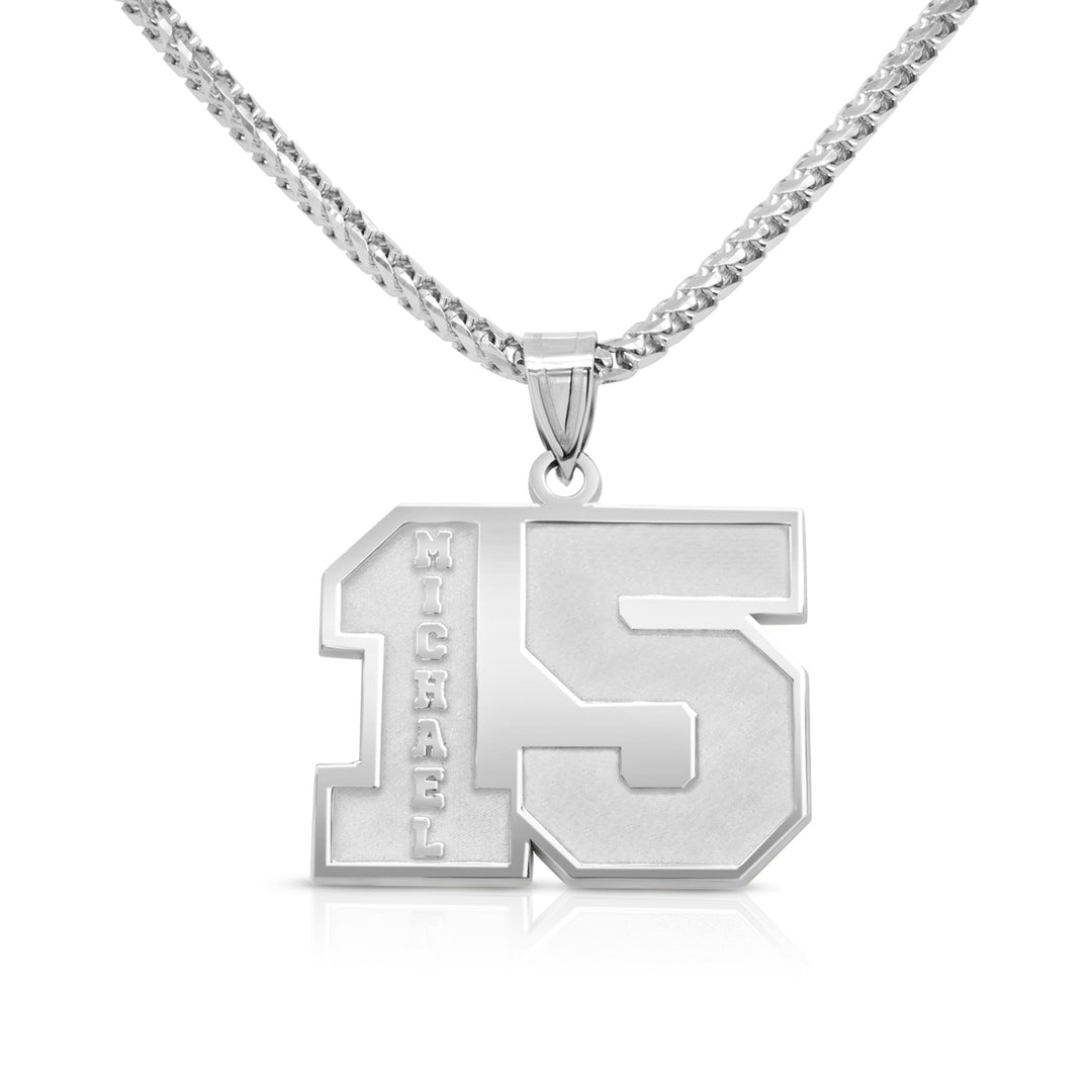 White gold necklace with pendant on a white background