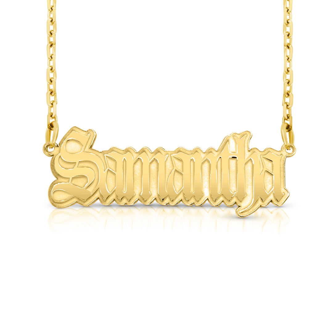 A sample of the nameplate with the name Samantha in Yellow Gold