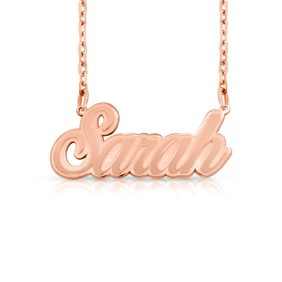 A sample of the nameplate with the name Sarah in Rose Gold