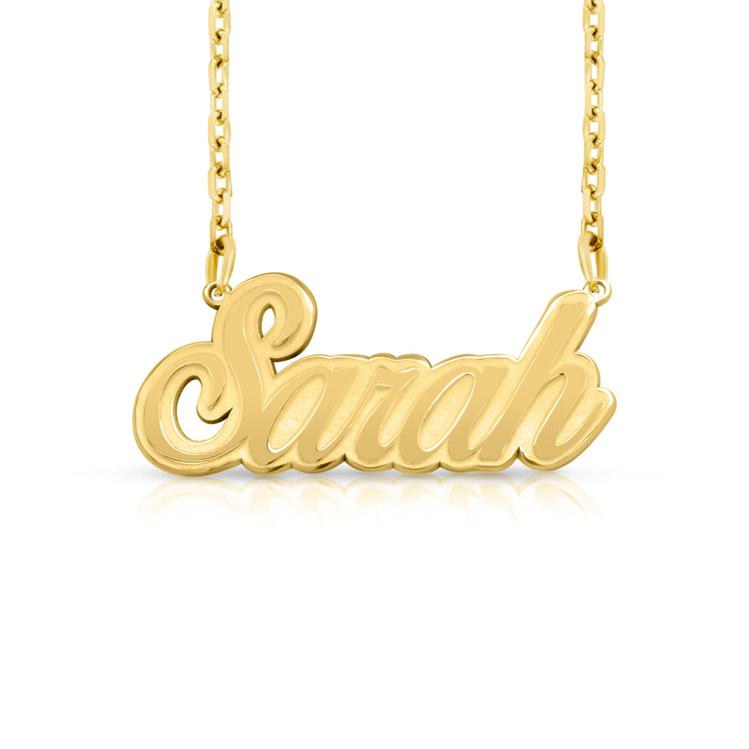 A sample of the nameplate with the name Sarah in Yellow Gold