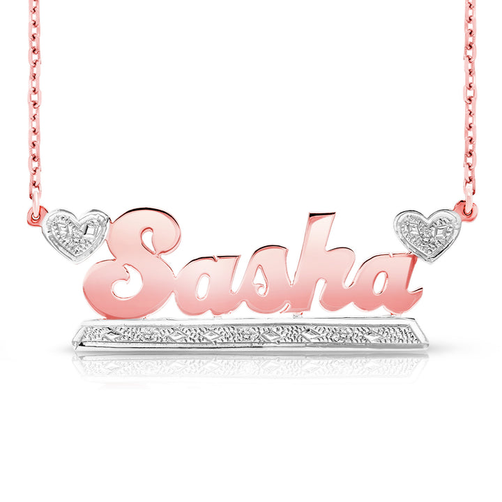 A Sample of the 14 Karat Bold Name Necklace with Two Hearts with the name Sasha in Rose