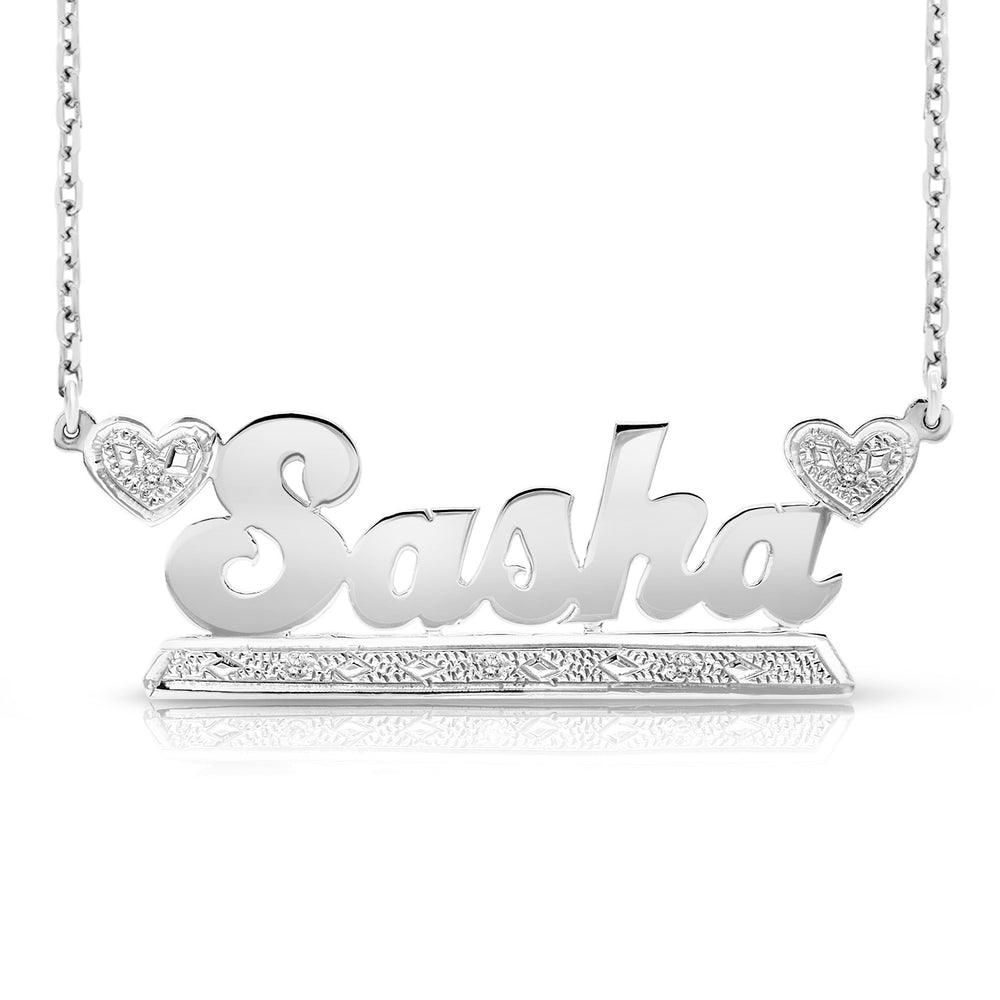 A Sample of the 14 Karat Bold Name Necklace with Two Hearts with the name Sasha in White