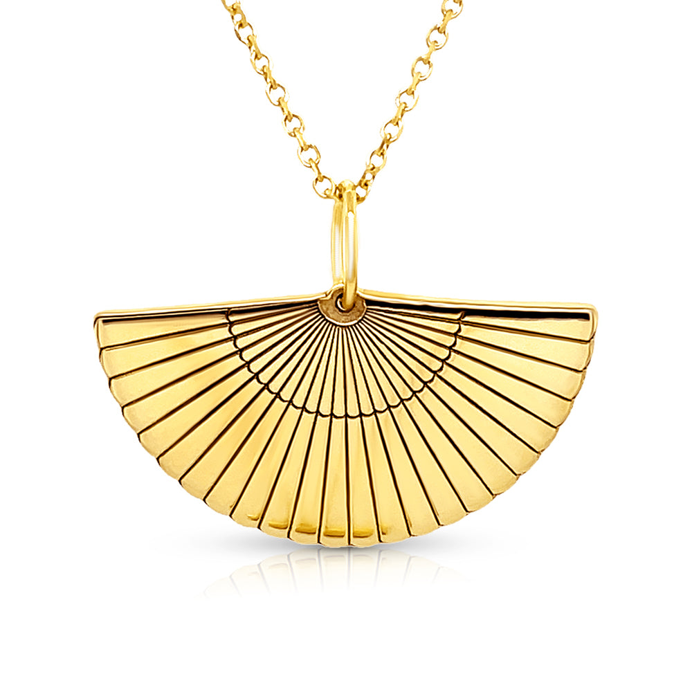 Yellow gold chain with pendant on a white background