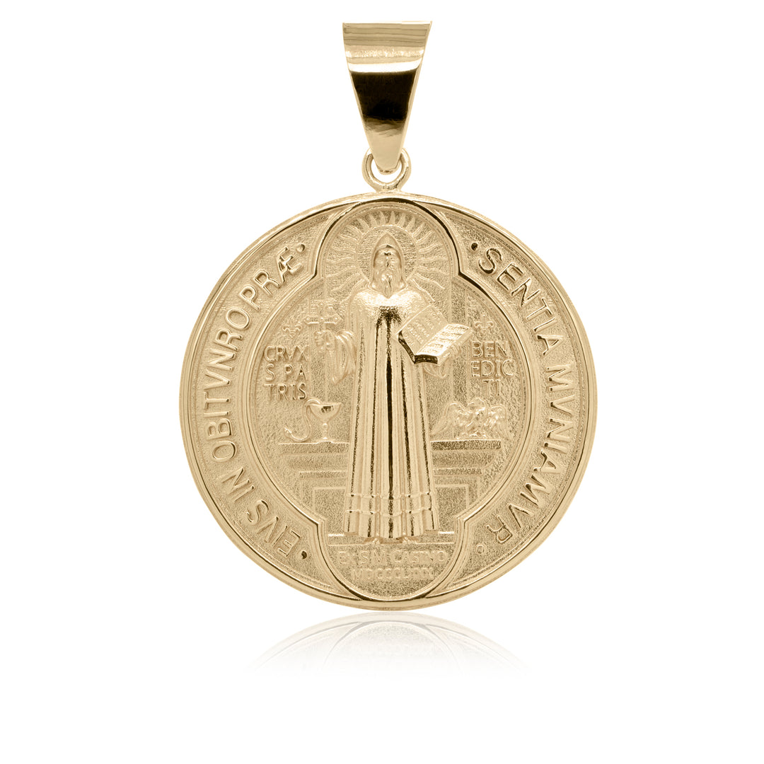 Yellow gold round pendant on a white background