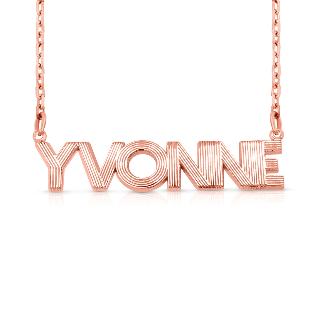 A sample of the nameplate with the name Yvonne in Rose Gold